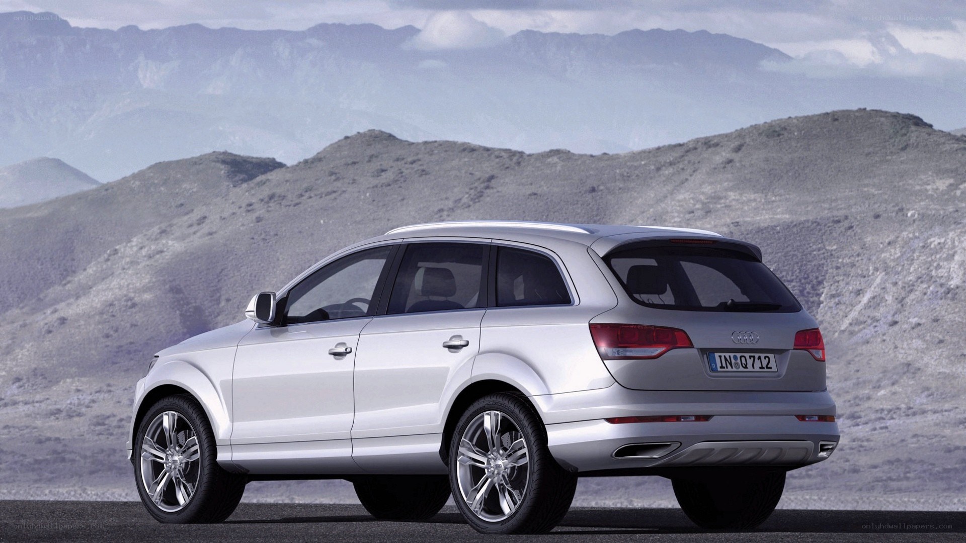 silver audi suv in desert