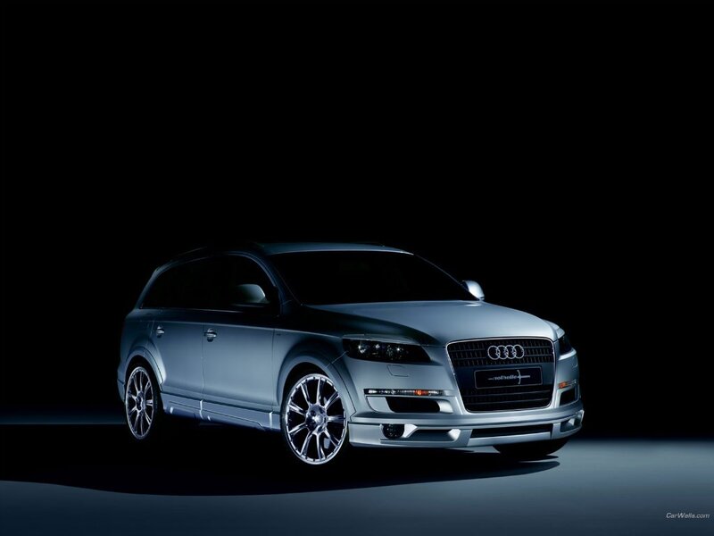 silver audi suv on dark background