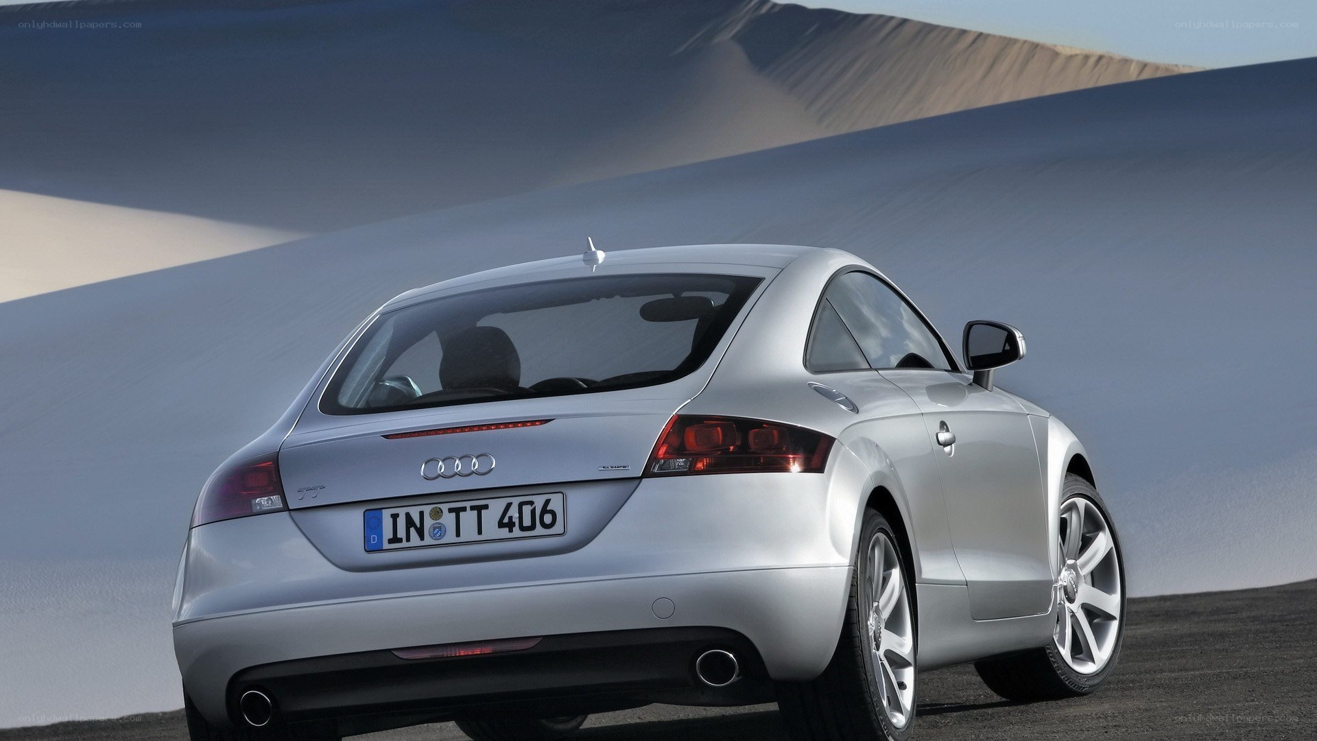 silver audi tt in desert