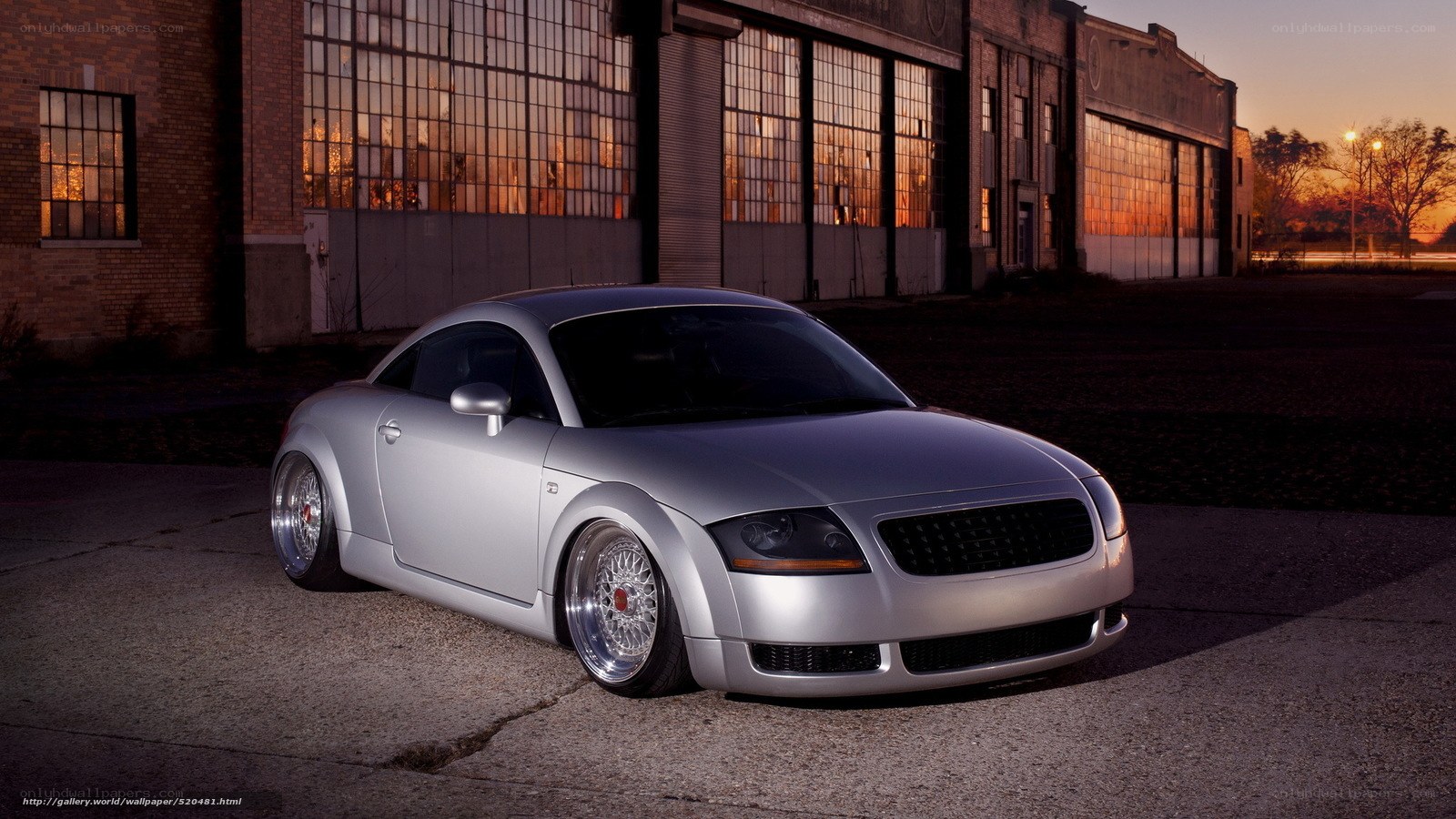 Silver Audi TT in industrial setting