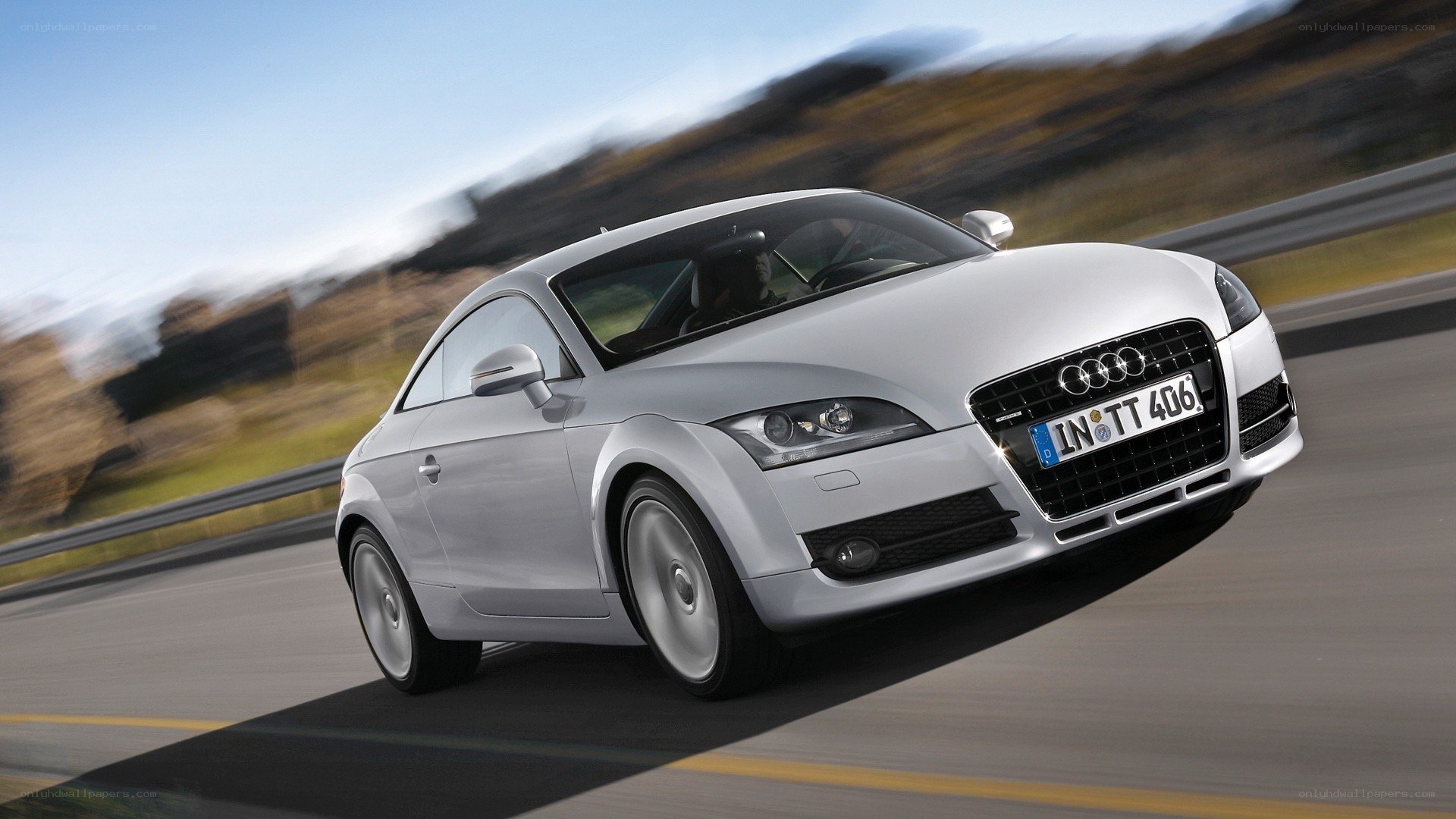 silver audi tt in motion