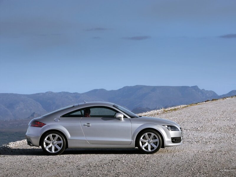 Silver Audi TT on a gravel hill