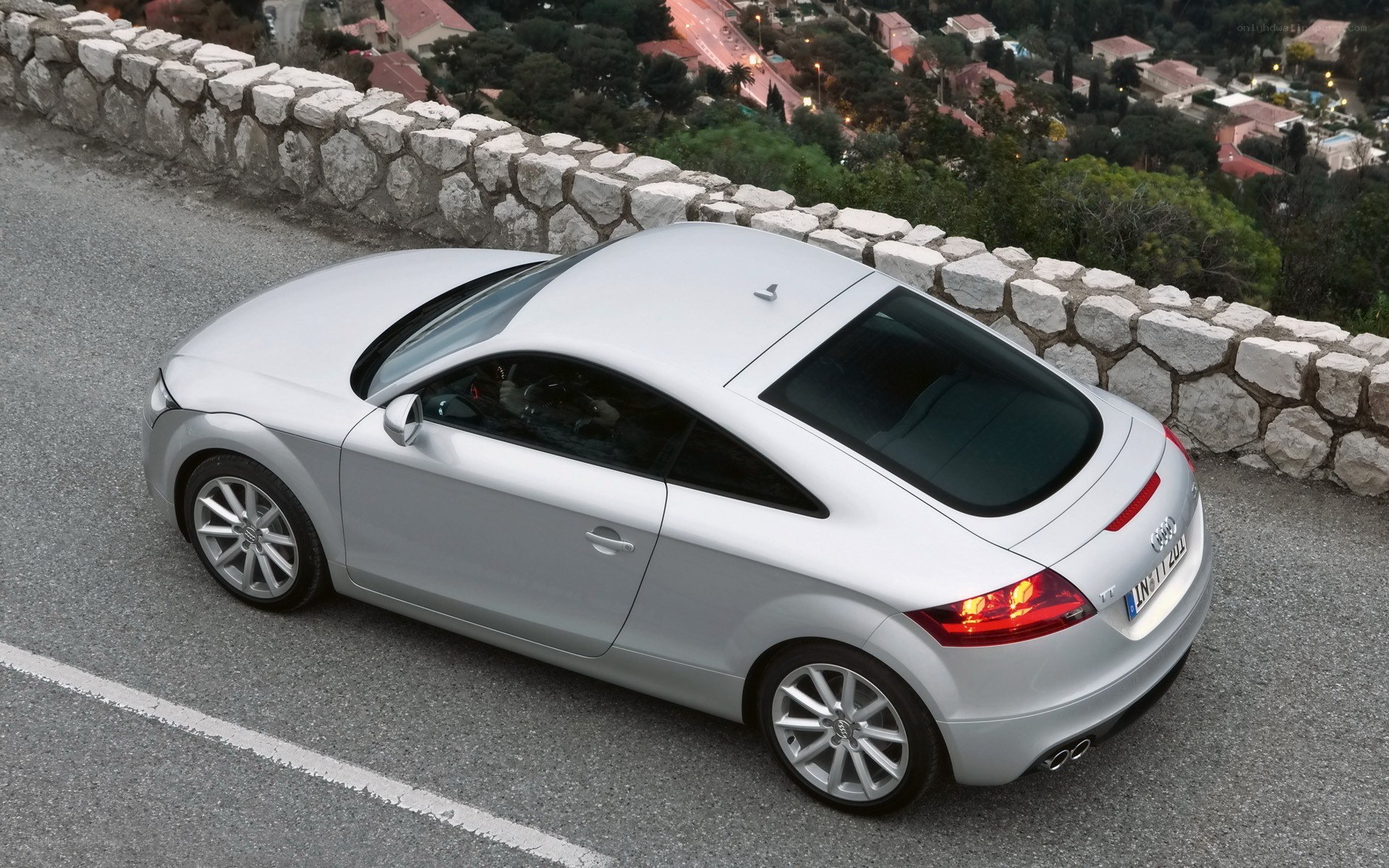 Silver Audi TT on a winding road