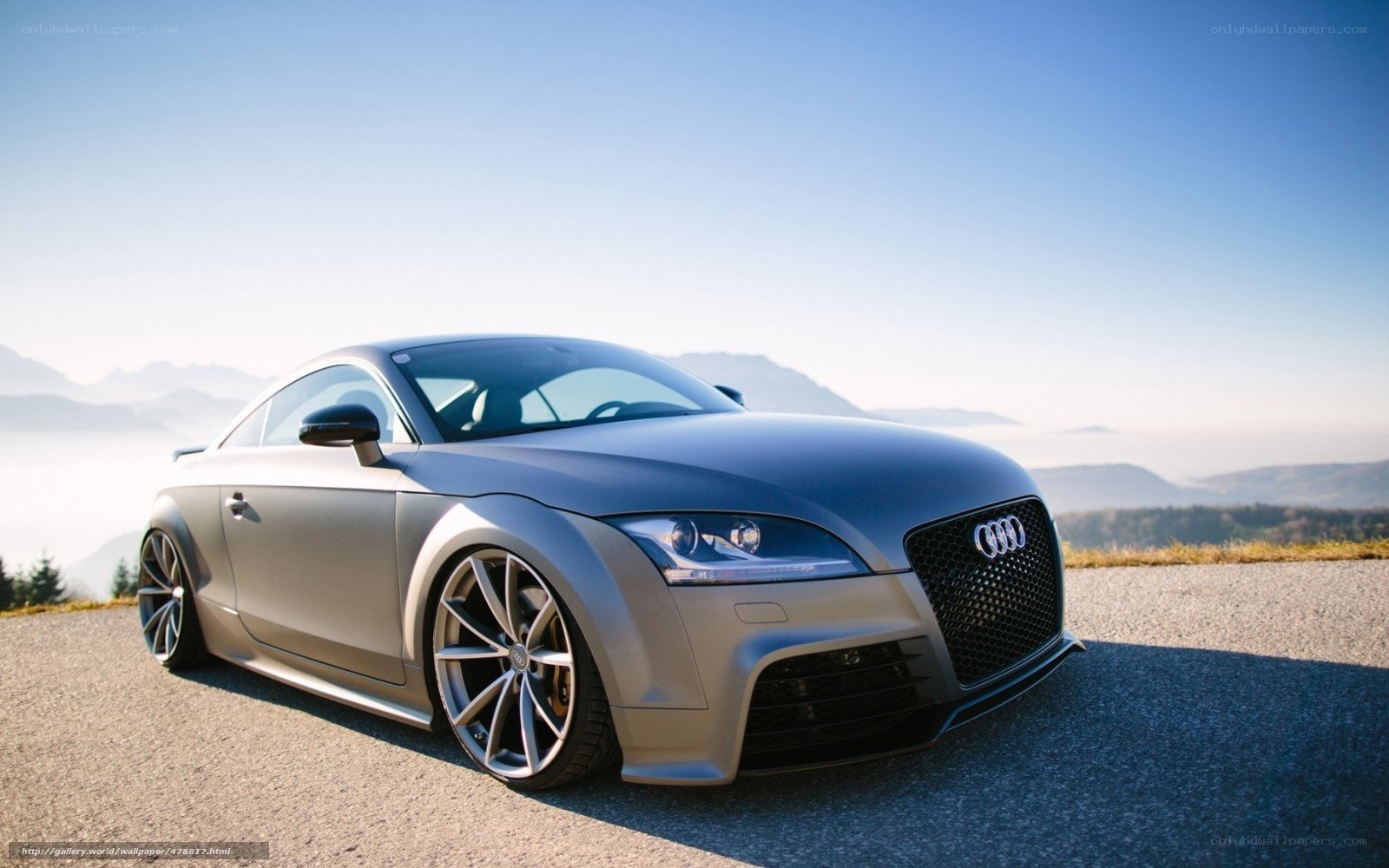 Silver Audi TT on mountain road
