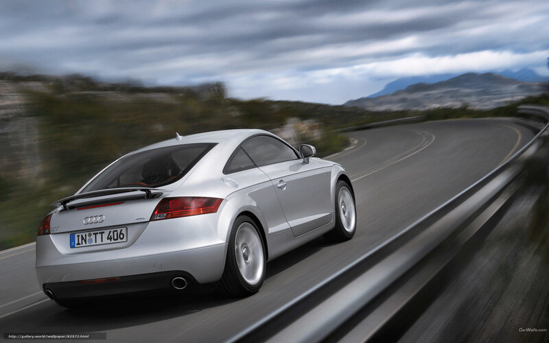 Silver Audi TT on winding road