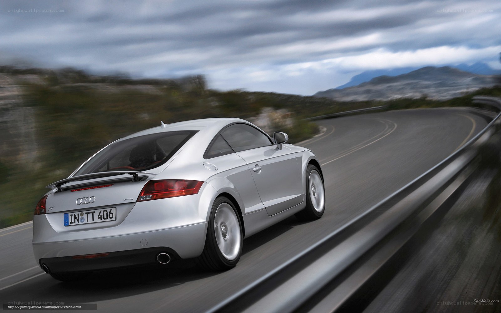 Silver Audi TT on winding road