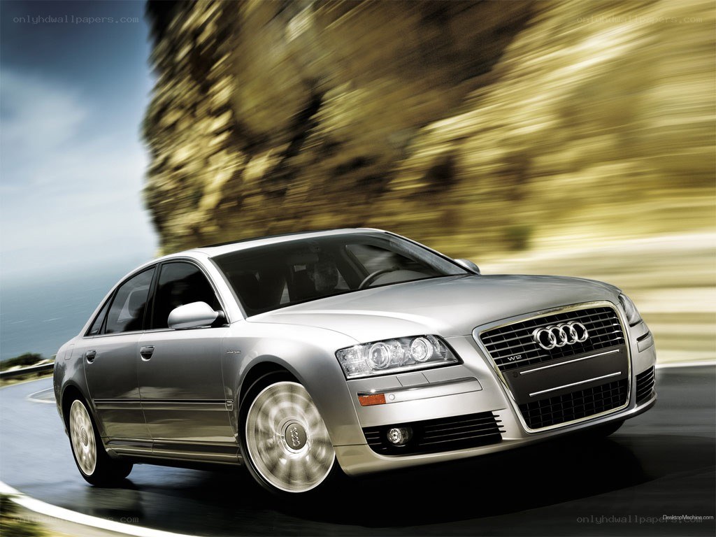 silver audi w12 in motion