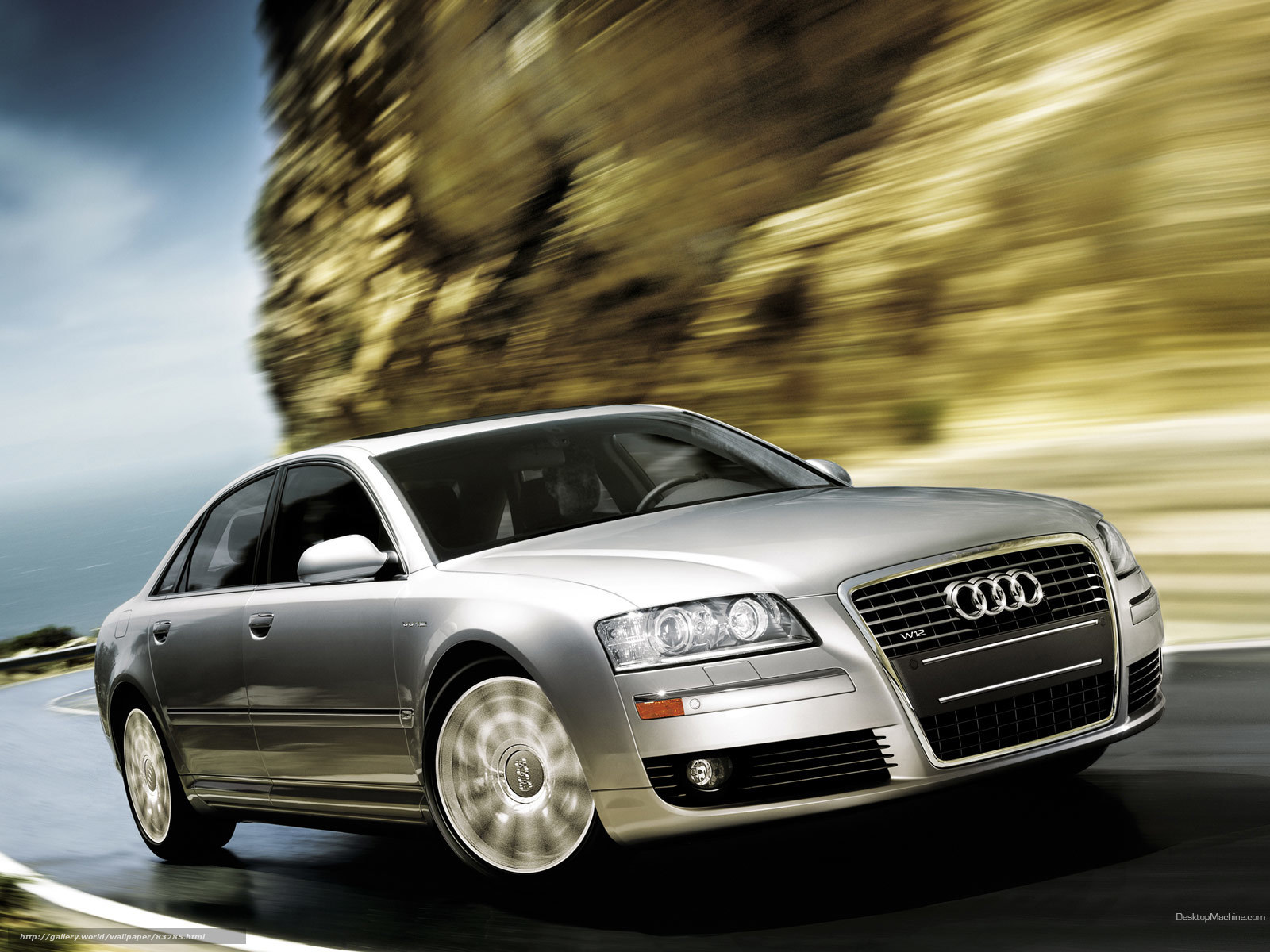 Silver Audi W12 in motion