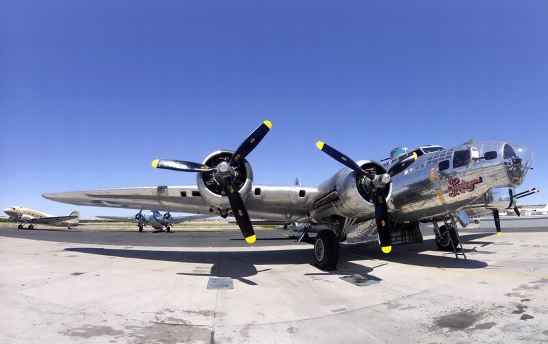 Silver B-17 bomber on tarmac