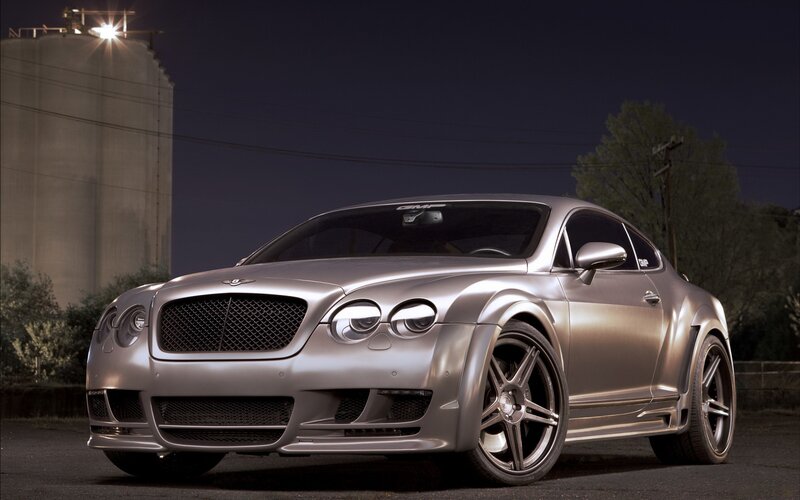 Silver Bentley at night