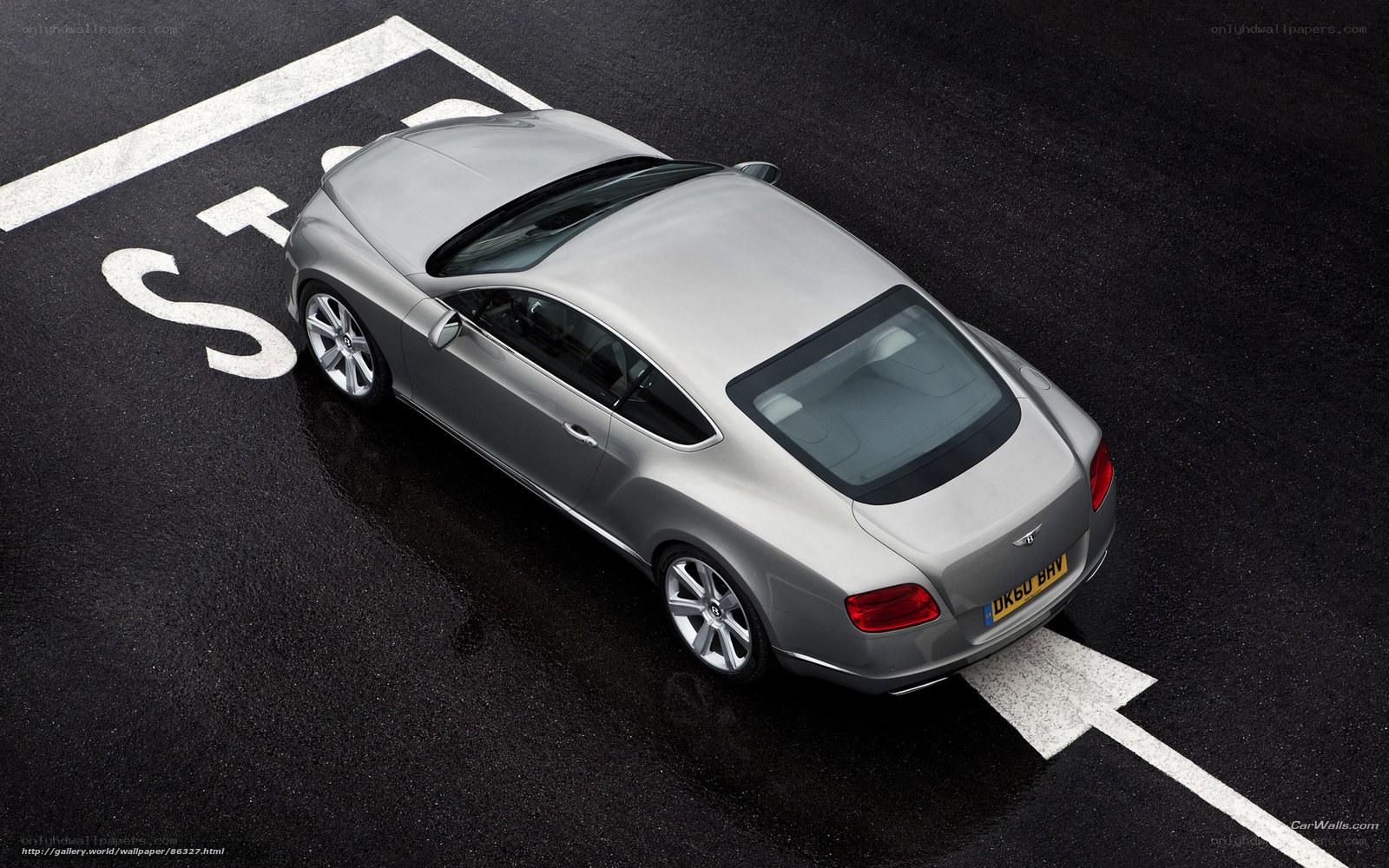 silver bentley coupe on asphalt