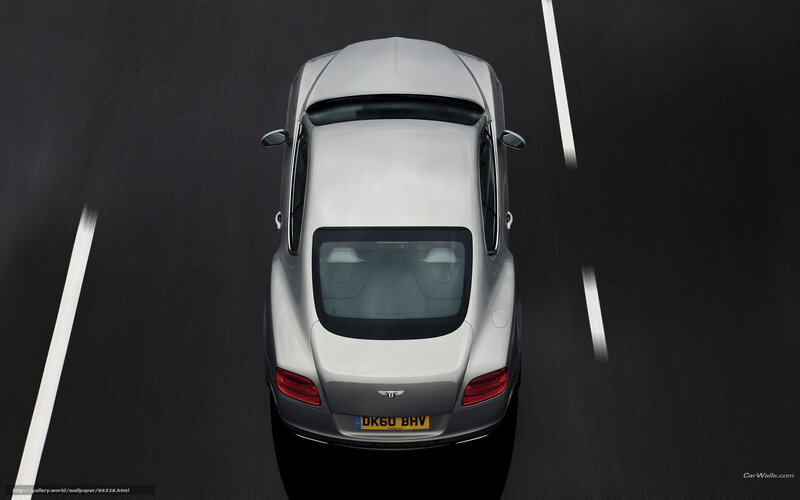 silver bentley driving on road