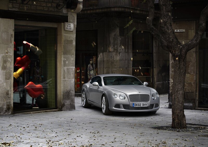 Silver Bentley on a city street