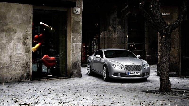 Silver Bentley on a city street