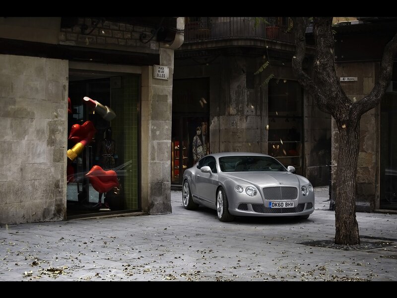 Silver Bentley on a city street