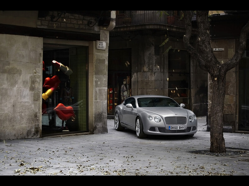 Silver Bentley on a city street