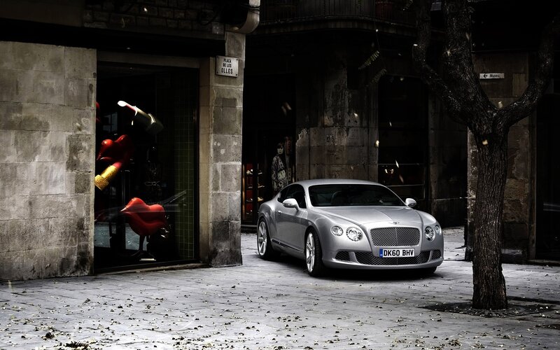Silver Bentley on a city street