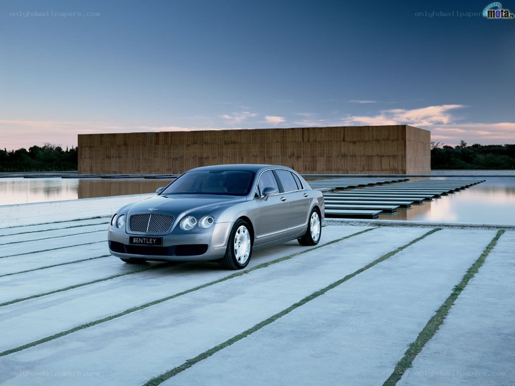 Silver Bentley on modern plaza