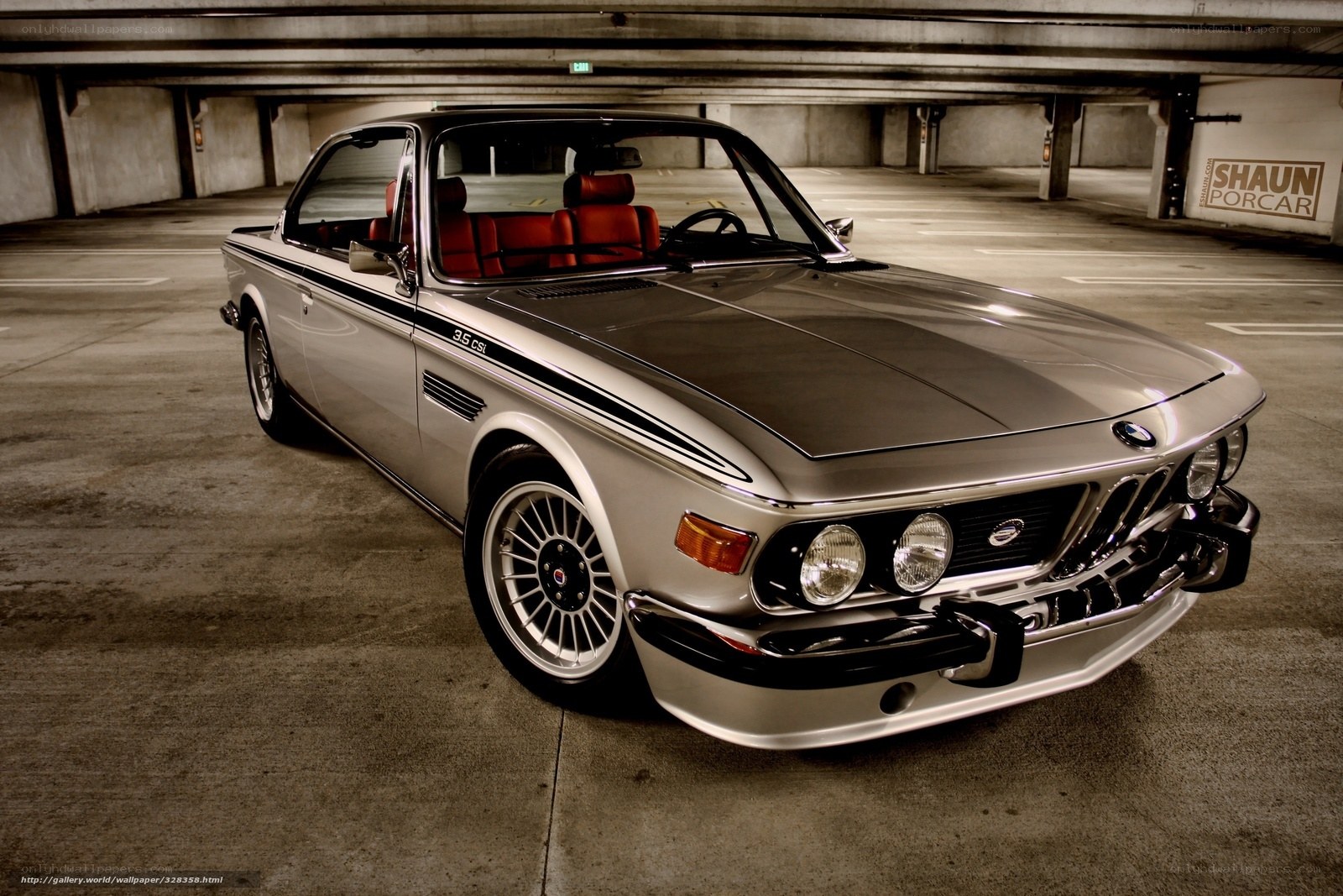Silver BMW 3.5 CSL in parking garage
