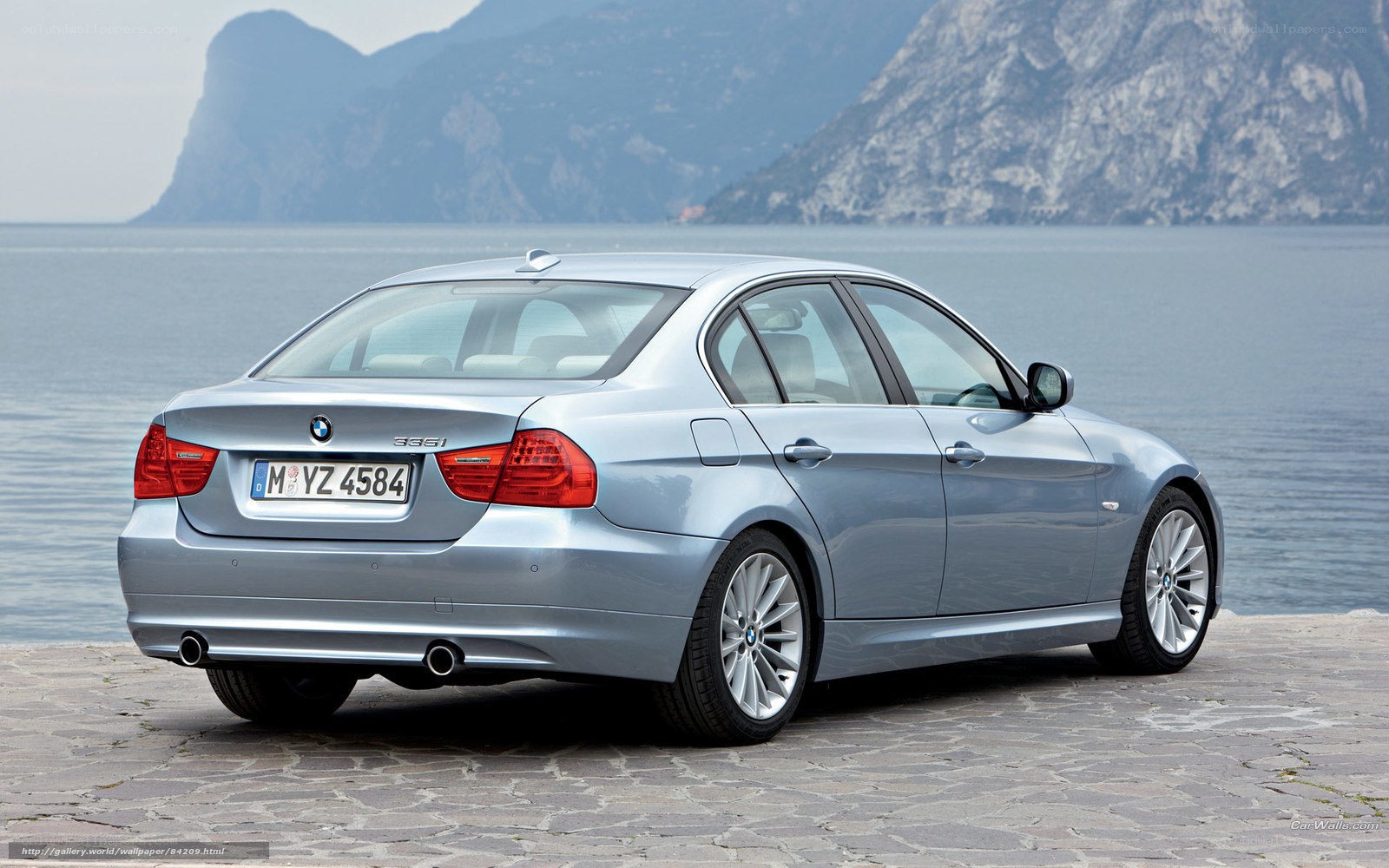 silver bmw 335i by the lake