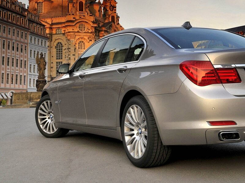 Silver BMW 7-series — Dramatic, Sunset