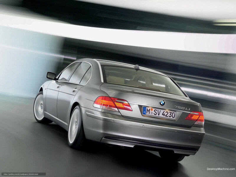 silver bmw 750li in motion