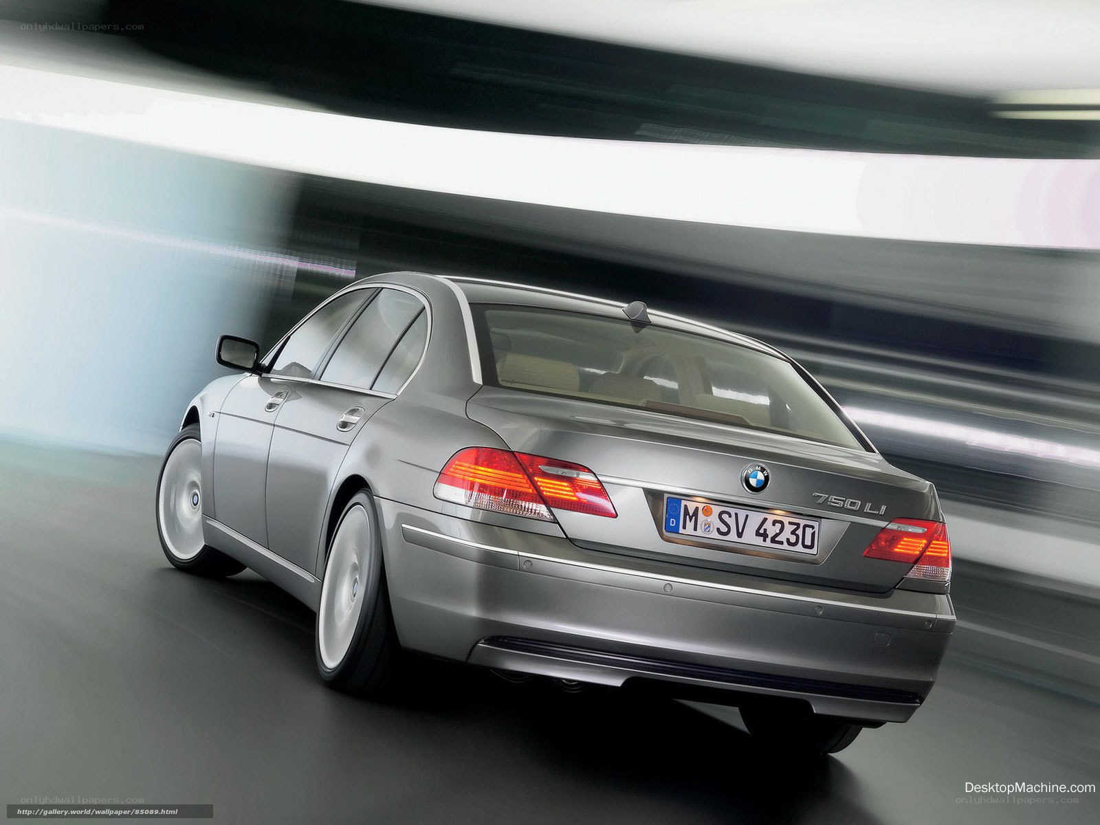silver bmw 750li in motion