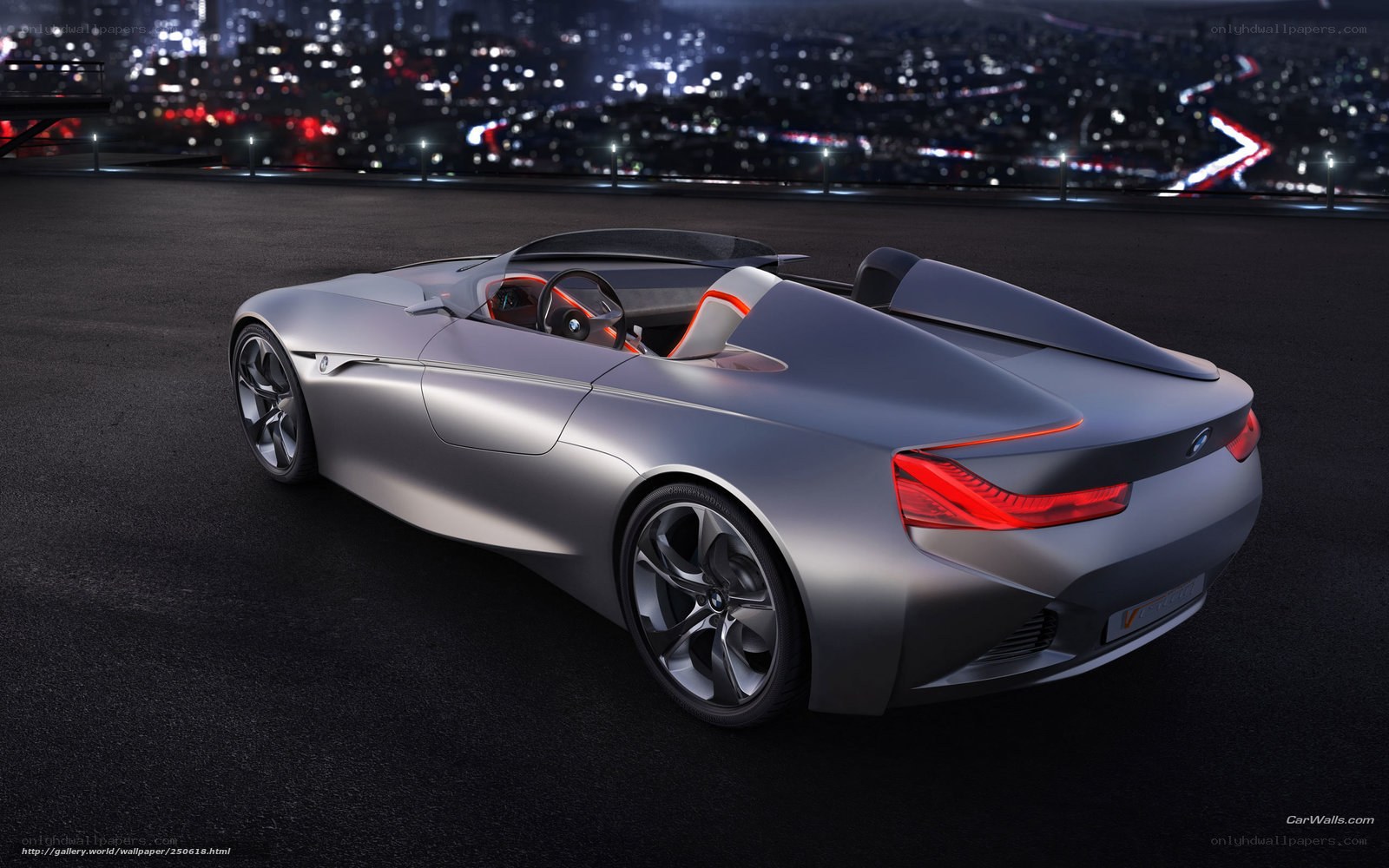 Silver BMW concept car at night
