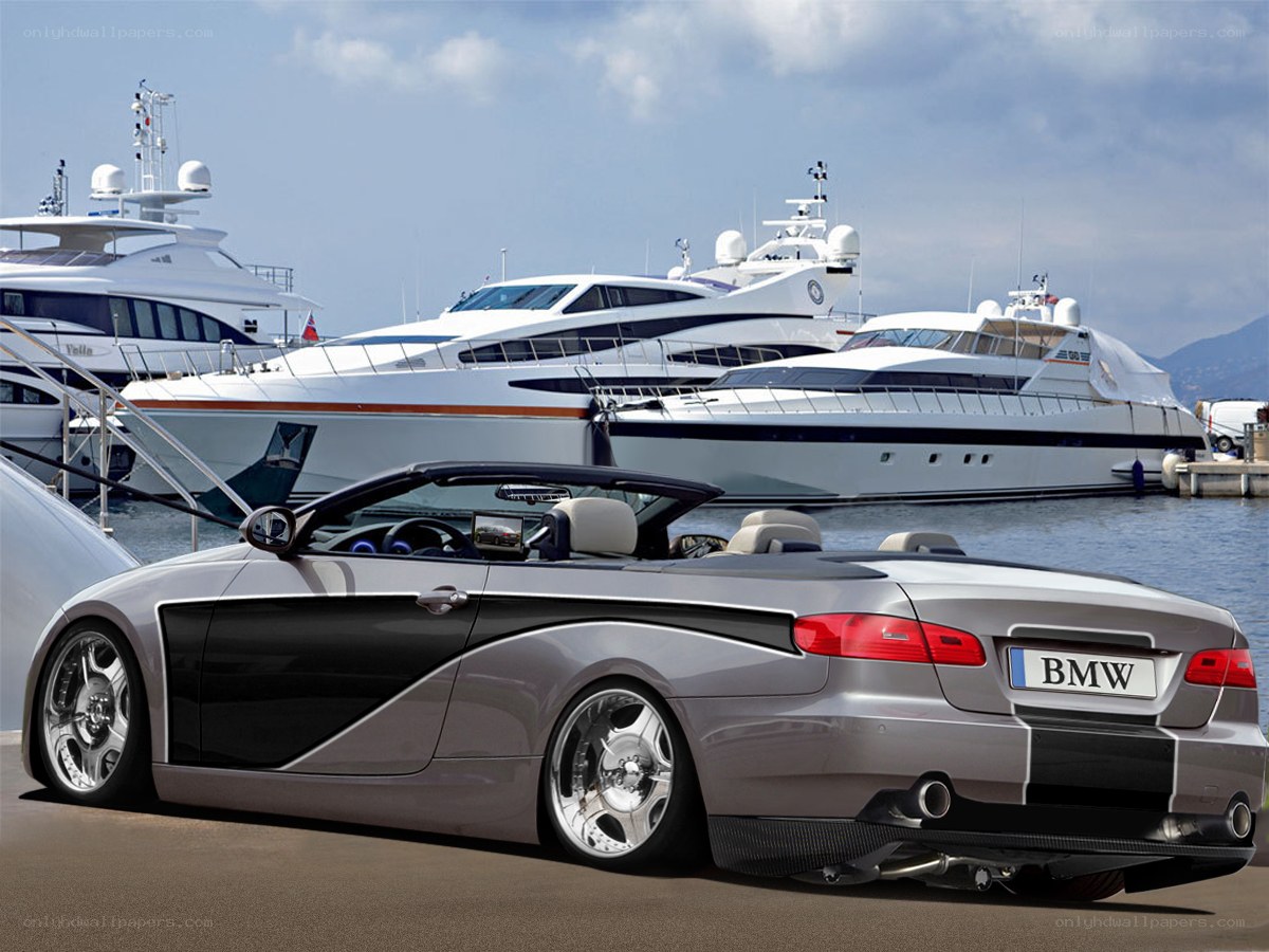 Silver BMW convertible at marina