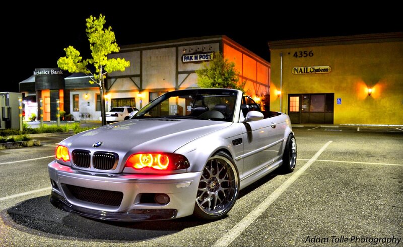 silver bmw convertible at night