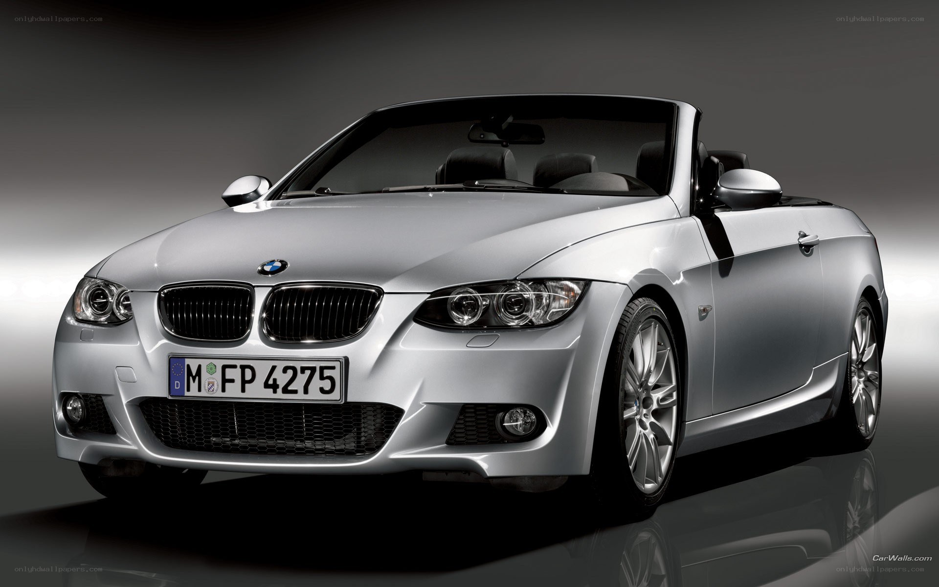 silver bmw convertible car