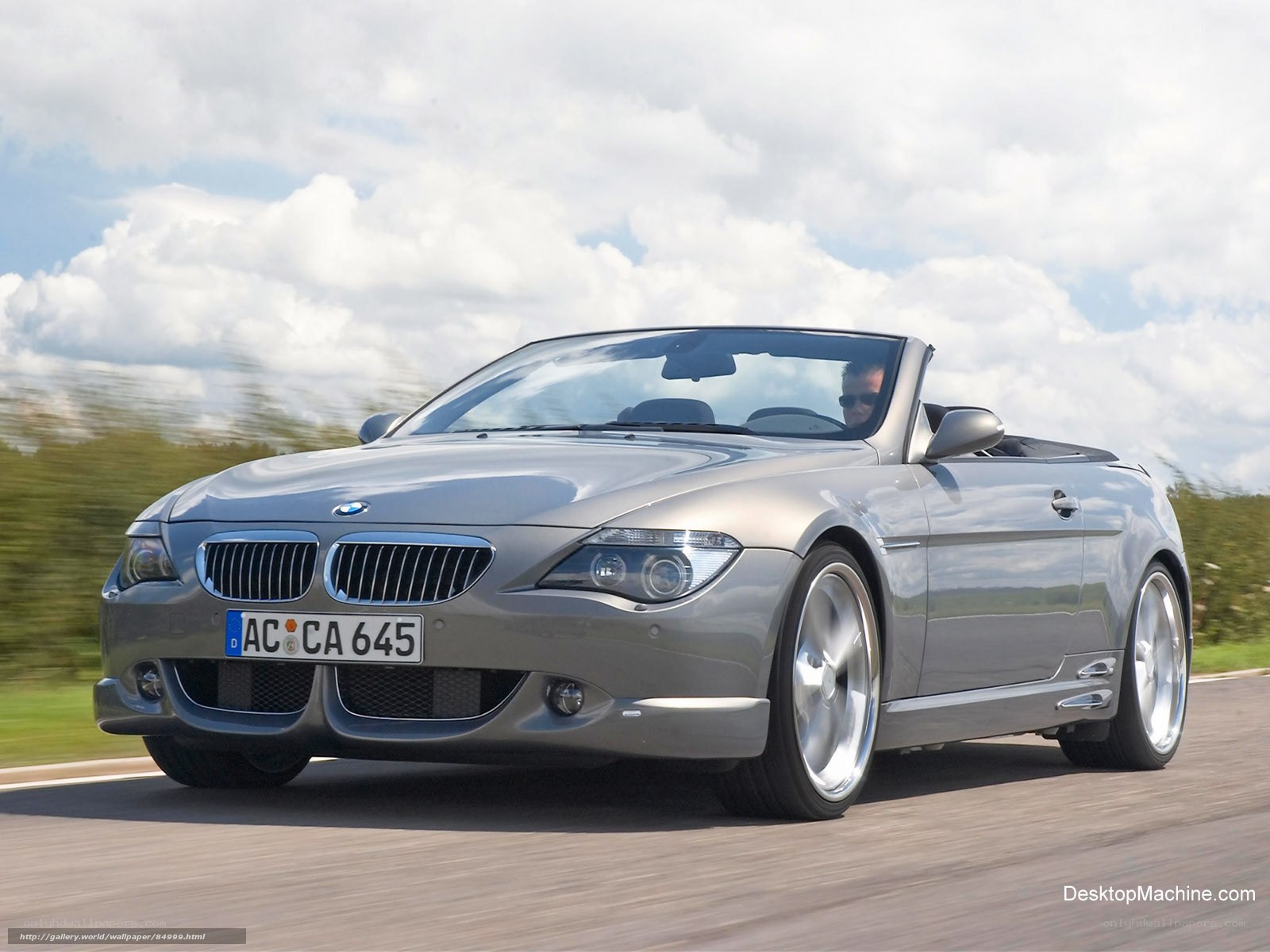 silver bmw convertible driving