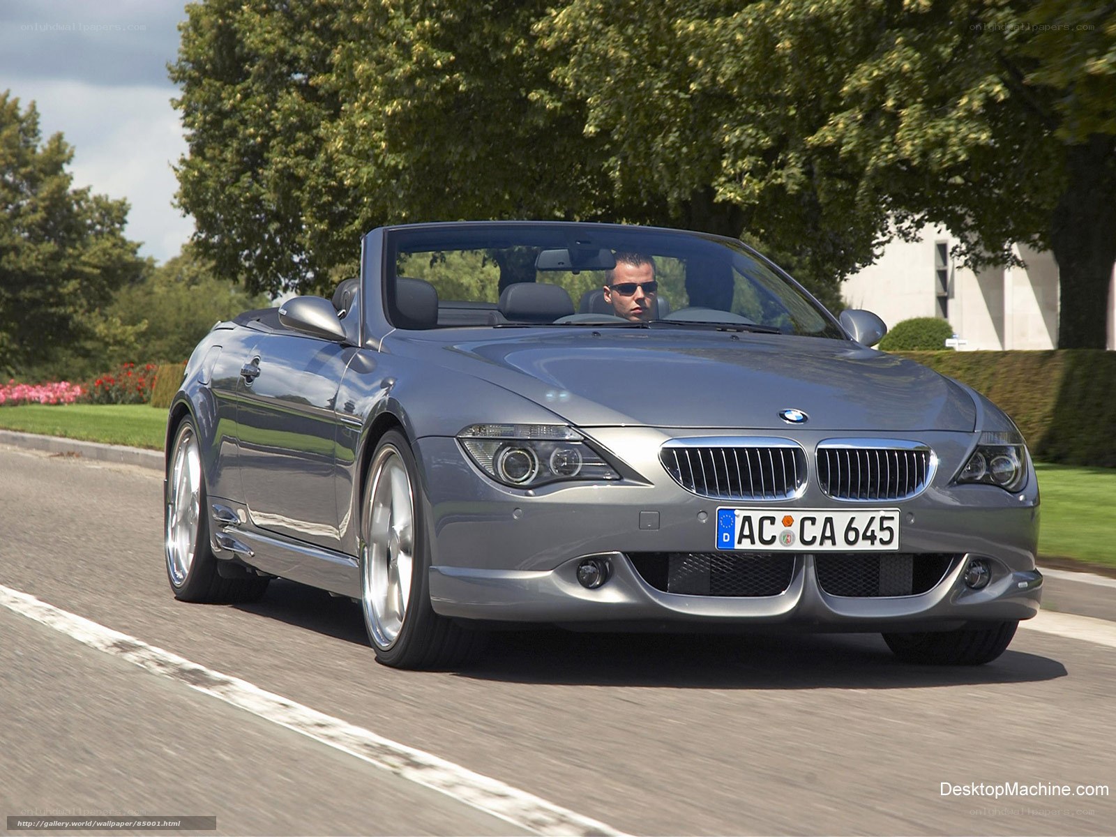 silver bmw convertible driving