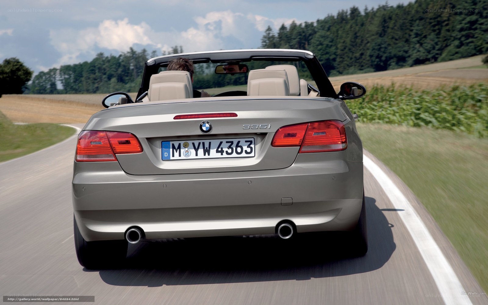 silver bmw convertible driving