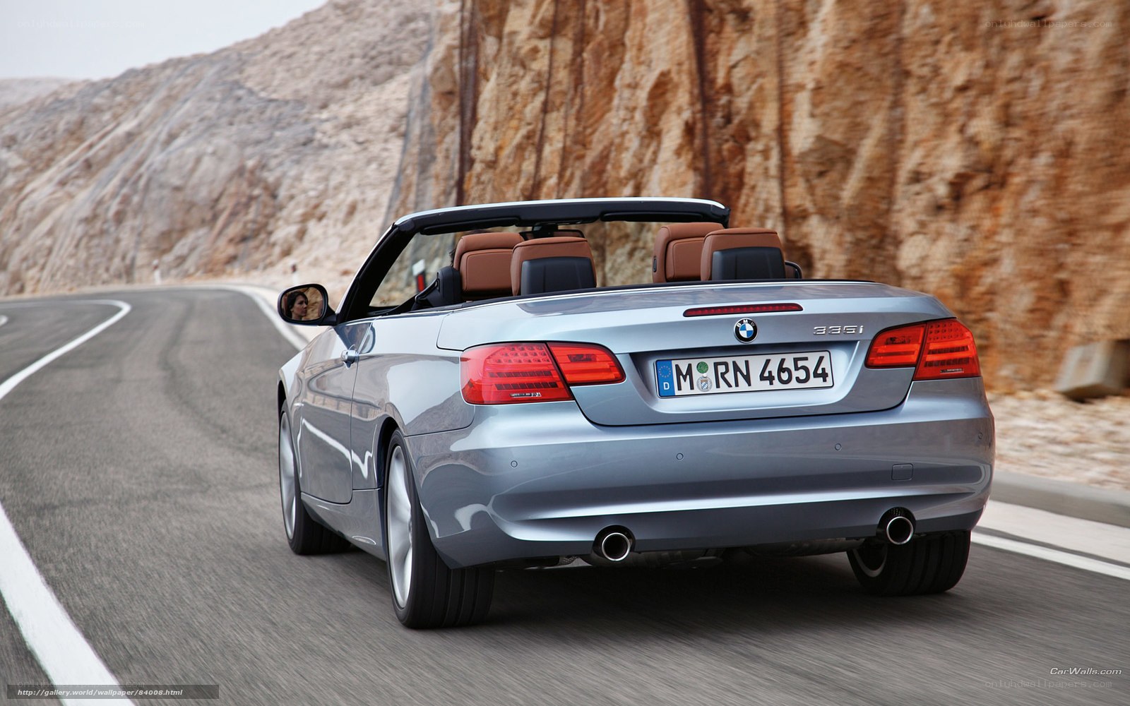 silver bmw convertible on road