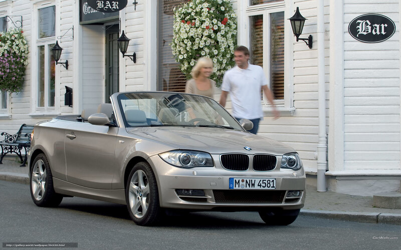 Silver BMW convertible on street