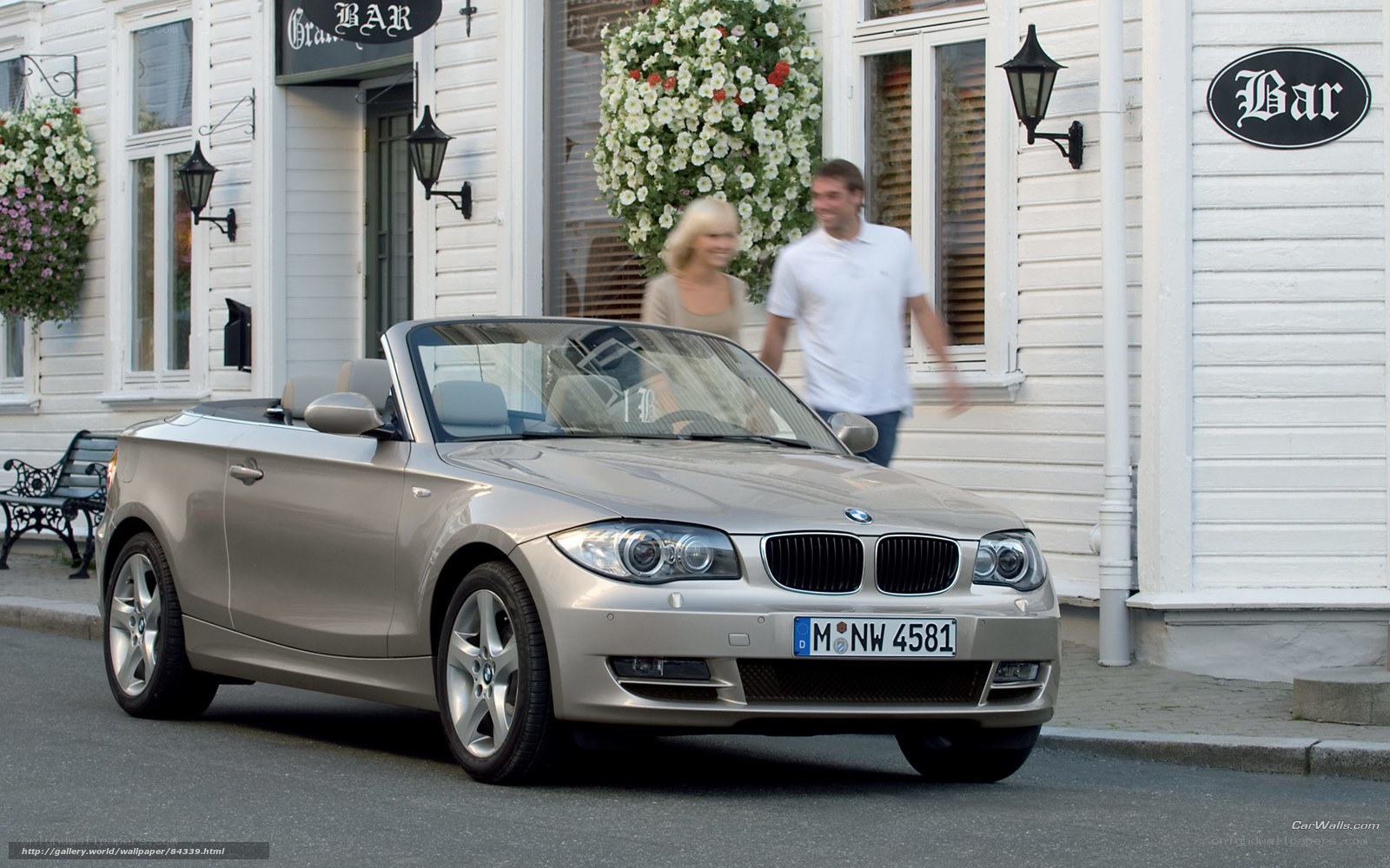Silver BMW convertible on street
