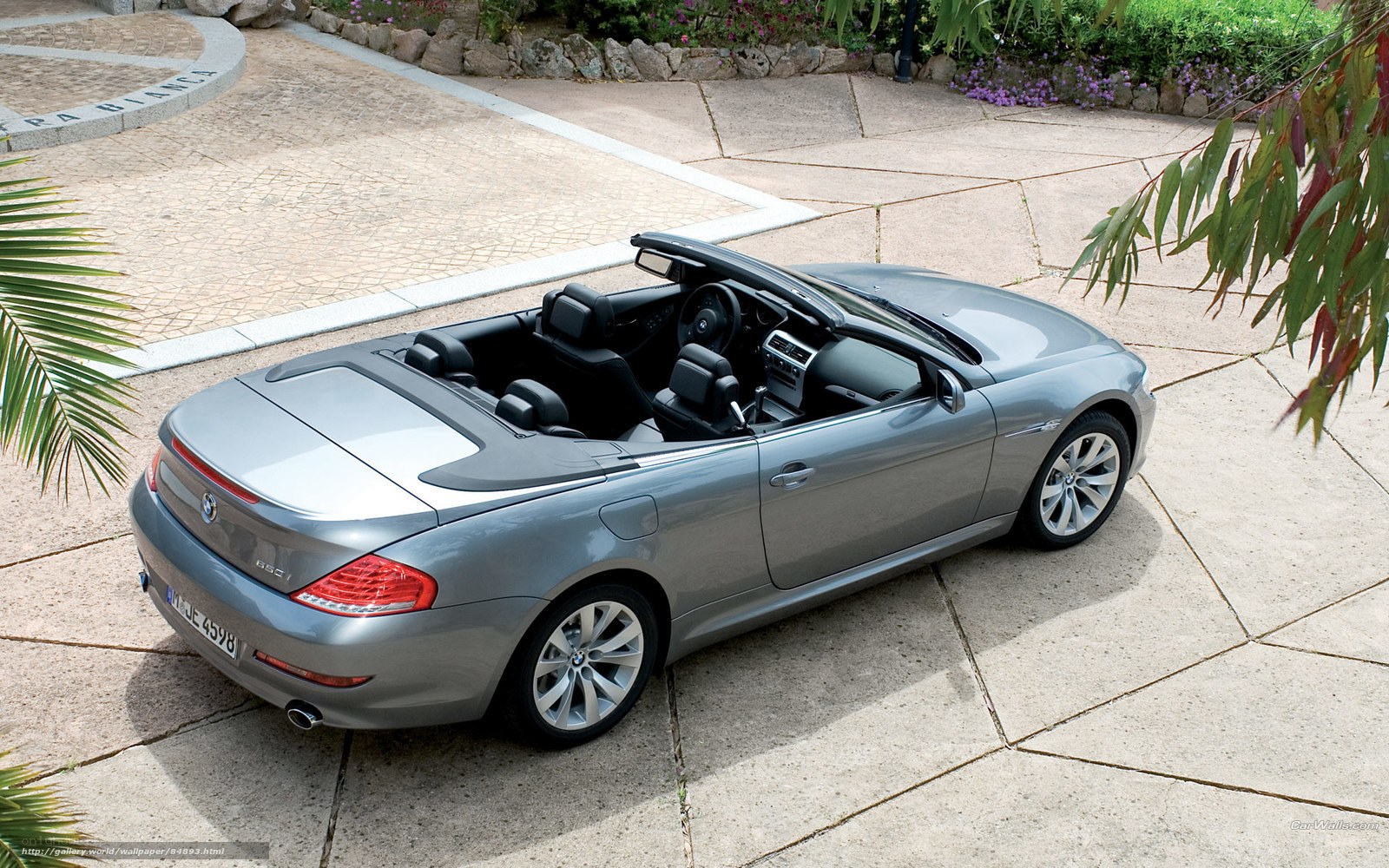 silver bmw convertible parked