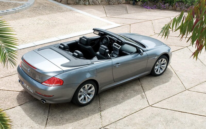 Silver BMW convertible parked