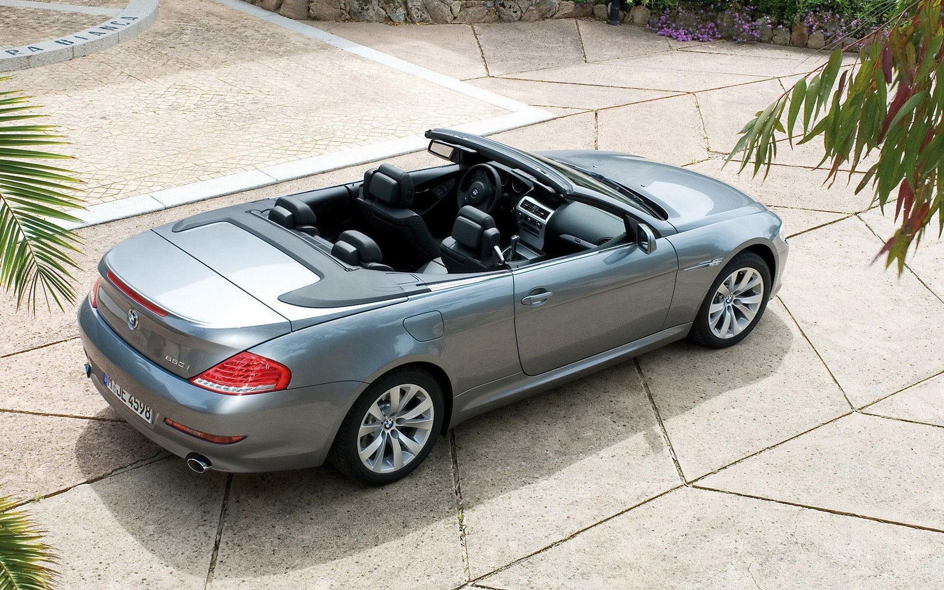 Silver BMW convertible parked