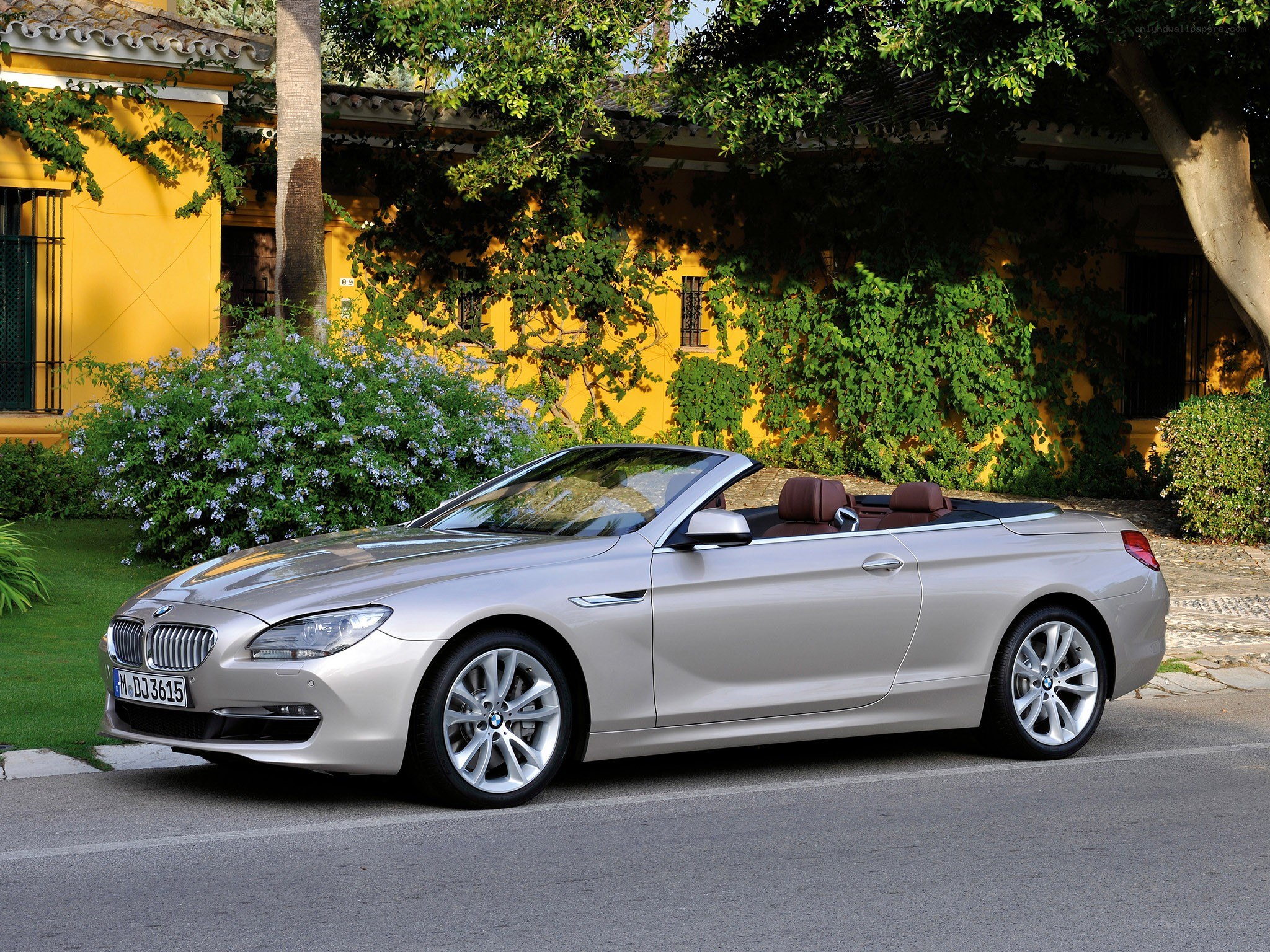 Silver BMW convertible parked