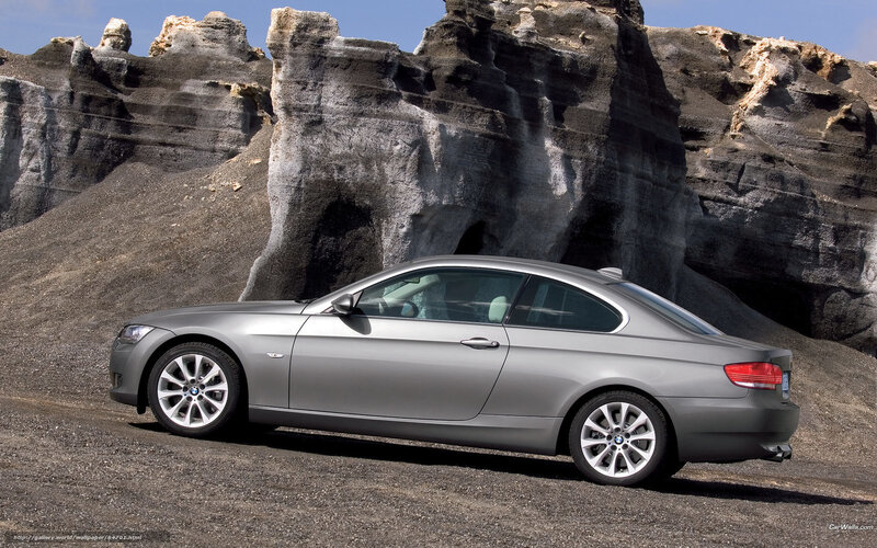 silver bmw coupe in desert