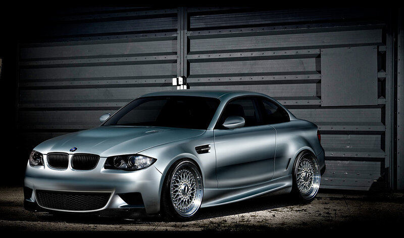 silver bmw coupe in garage
