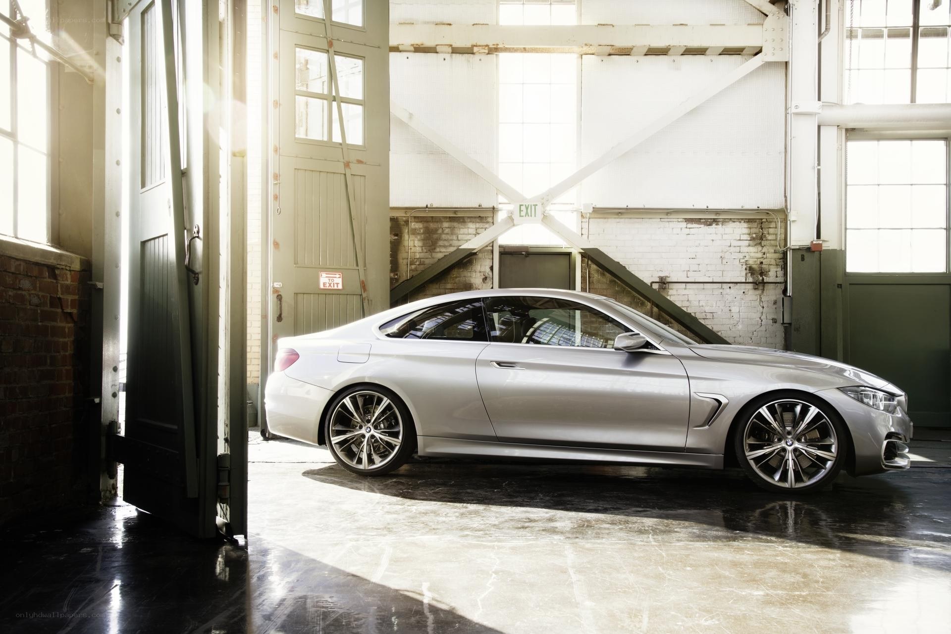 Silver BMW coupe in warehouse