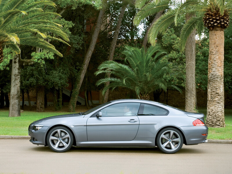 Silver BMW coupe on a road