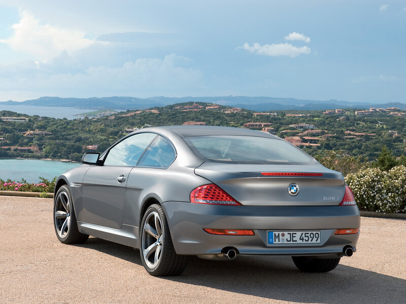 Silver BMW coupe on a scenic overlook