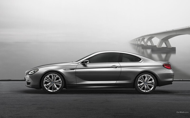 silver bmw coupe on bridge