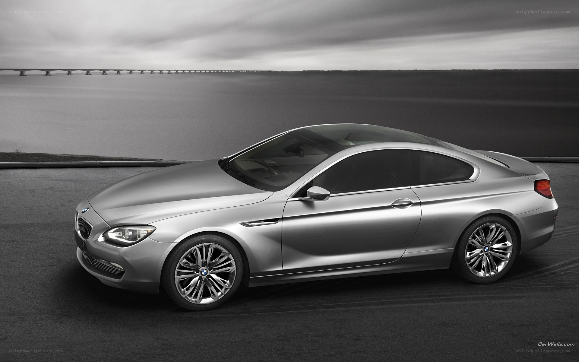 silver bmw coupe on road