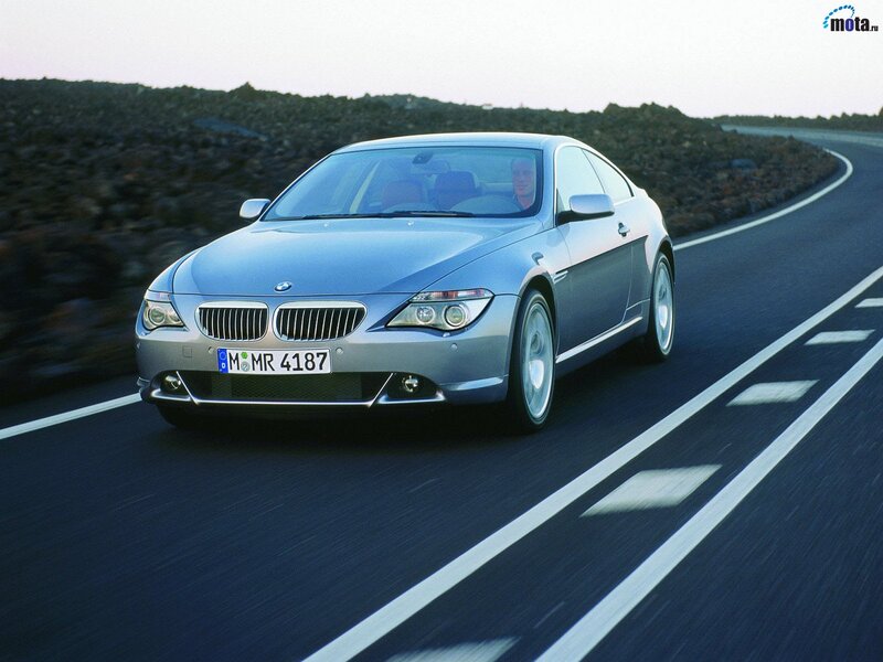 silver bmw coupe on road