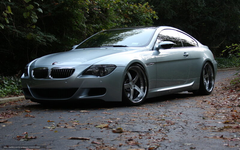silver bmw coupe on road